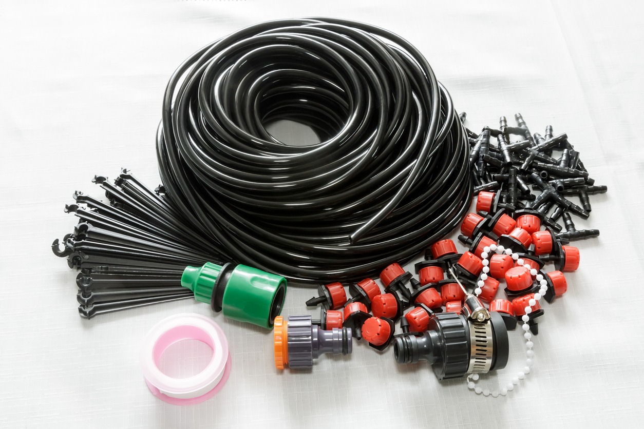 Gardening drip irrigation kit components on display.