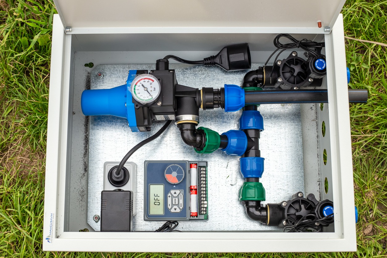 Irrigation control box with pressure gauge and valves.